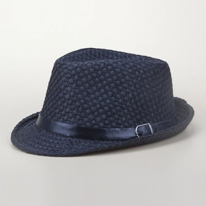 Close-up of dark blue woven straw hat with black leather strap and silver metal buckle
