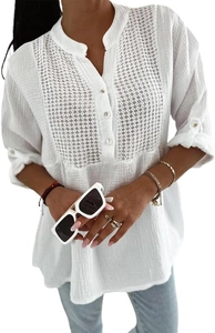 Close-up of white cotton linen shirt with intricate geometric lace hollow out details