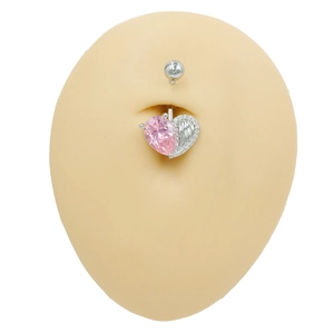 Detail of pink heart navel ring with zircon inlay shown on a silicone body model