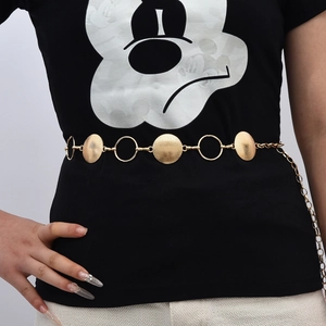 Adjustable golden metal waist chain featuring round disks and rings on model