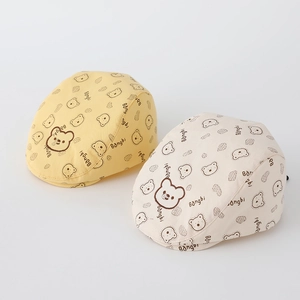 Infant cotton beret hats in yellow and beige colors featuring a cute bear print pattern