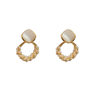 Elegant gold earrings with vintage emerald cut stone and micro pearl hoop details