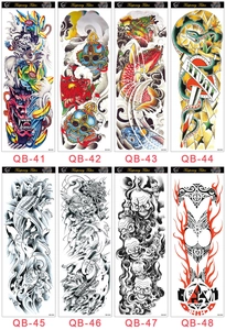 Flat lay of eight waterproof full arm temporary tattoo stickers with diverse designs