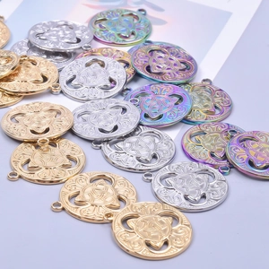 Polished stainless steel witch knot pendants in gold, silver, and rainbow finishes