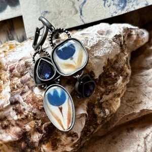 Vintage Egyptian style flower earrings with blue tulip enamel and teardrop gems on shell