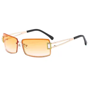 Y2K rimless square sunglasses with orange gradient lenses and gold metal frames