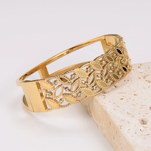 Vintage hollow out gold plated stainless steel bracelet with zircon inlay on beige stone