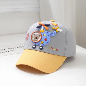 Detail of grey and yellow kids baseball cap with a 3D cartoon helicopter on front