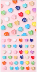 Macro display of colorful heart-shaped ceramic beads for handmade jewelry DIY projects