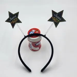 Detail of Happy New Year star headband with silver springs on a red display stand