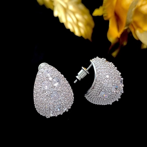 Elegant silver-tone water drop stud earrings with pavé-set round cubic zirconia on black background