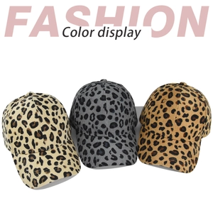 Detailed color display of three leopard print corduroy baseball caps in beige, grey and brown