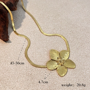 French vintage style gold flower pendant with flat snake herringbone chain necklace