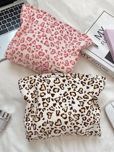 Corduroy leopard heart print cosmetic bags set in stylish office desktop setting
