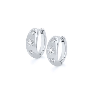 Detail view of S925 silver hoop earrings with starburst zircon stone settings