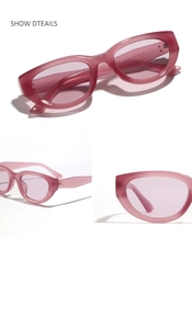 Detail of matte pink cat eye sunglasses showing frame texture and inner temple size specs