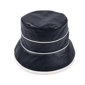 Fashionable black leather bucket hat with white contrast stitching and wide brim for women