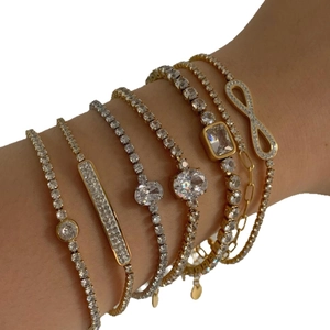 Multi-layer gold and silver tone tennis bracelet set with sparkling cubic zirconia stones