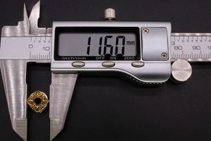 Detailed measurement of 11.60mm golden vintage alloy bead with embossed patterns