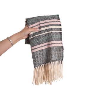Striped warm winter scarf with pink and black herringbone pattern and fringe detail