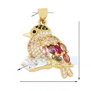 Detailed view of bird jewelry pendant with colorful gemstones and white crystals