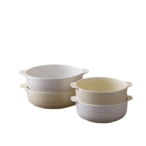 Ceramic soup bowls with handles and textured stripes in cream and white set