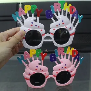 Cute cupcake-shaped party glasses in pink and white with Happy Birthday letters