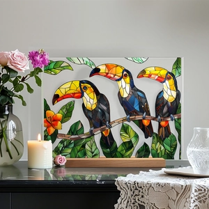 Detail of three colorful acrylic toucans on wood base with a faux glass stained finish