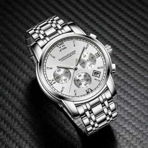 Detail view of an elegant men's stainless steel watch featuring a white chronograph dial