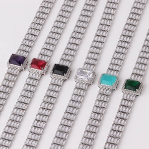 Detail view of rectangular zircon bracelets in purple, red, black, blue, and green colors