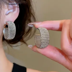 Silver wide mesh C-shaped hoop earrings with textured metal lattice design for women