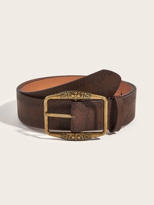 Close-up of deep brown leather belt featuring vintage embossed texture and gold buckle