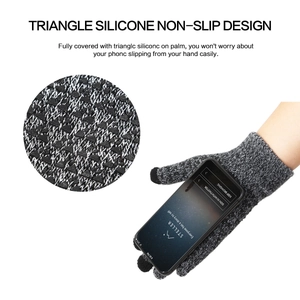 Detail of grey winter knit glove with triangle silicone non-slip palm design for phone grip