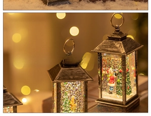 Close-up of vintage bronze Christmas lantern featuring Santa Claus and glitter snow
