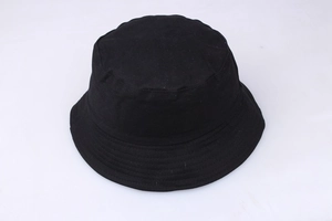Top view of a black cotton bucket hat showing stitching detail and flat top crown