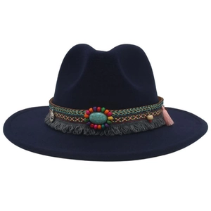 Detail of navy blue felt cowboy hat with ethnic beaded band and turquoise stone accent
