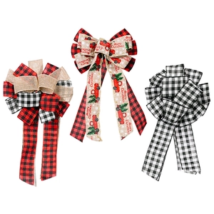 Three plaid Christmas bows in red black and white linen patterns for tree toppers