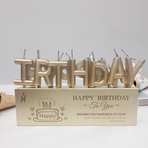 Golden Happy Birthday letter candle set with decorative base for party cake topper