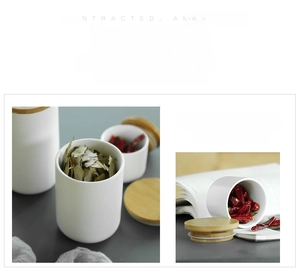 Detail showing airtight ceramic storage jar with natural wood lid for spices and herbs