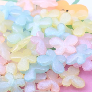 Colorful glitter resin butterfly beads in pastel macaron shades for DIY jewelry making