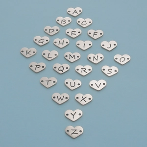 26-piece silver heart stainless steel alphabet charms with A-Z engraving and dual holes