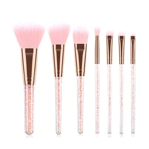 Detail of 7pcs makeup brushes with pink soft bristles and glitter-filled handles