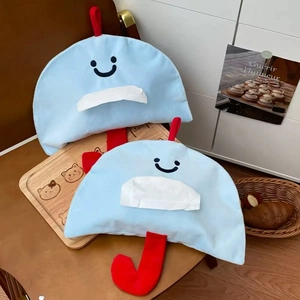 Detailed view of two cute blue umbrella-shaped wall-mounted fabric tissue storage bags