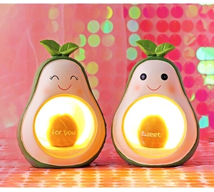 Detail of avocado night lights featuring glowing for you and sweet text accents
