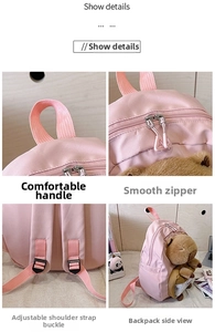 Pink Capybara backpack details showing soft handle, smooth zippers and bear plush charm