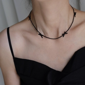 Handmade black bow necklace with spinel style small beads and titanium steel accents