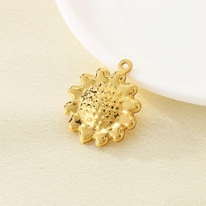 Macro shot of 304 stainless steel hollow sunflower pendant with mesh texture details