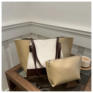 Minimalist large-capacity contrast color tote bag with small purse on a wooden table
