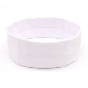 Detailed texture of white elastic yoga headband showing knit fabric and vertical stitching