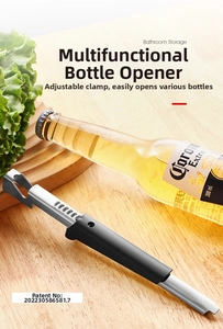 Close-up of adjustable stainless steel bottle opener on a wooden kitchen countertop